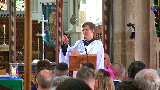 A curate addresses the congregation