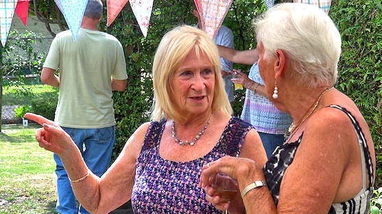 Two female guests at a party