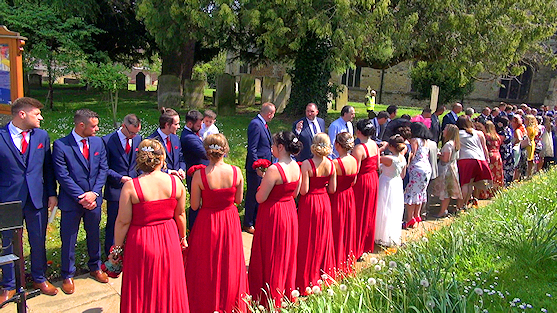 guests await the bride and groom so that they may throw confetti